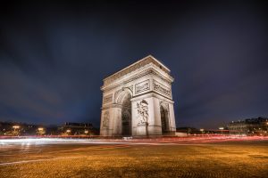 A beautiful scenery of the historic famous Arc of Triomphe during the evening time